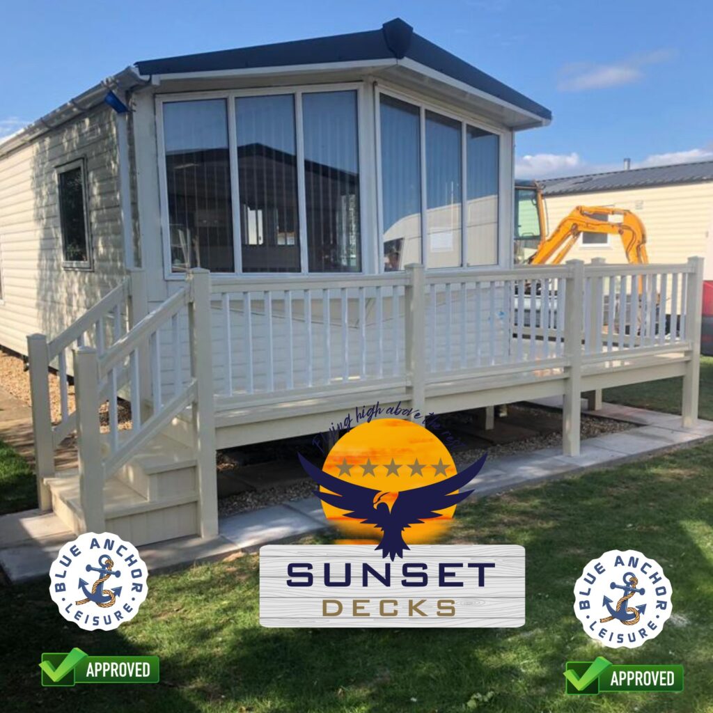 Raised UPVC caravan deck with railings and steps